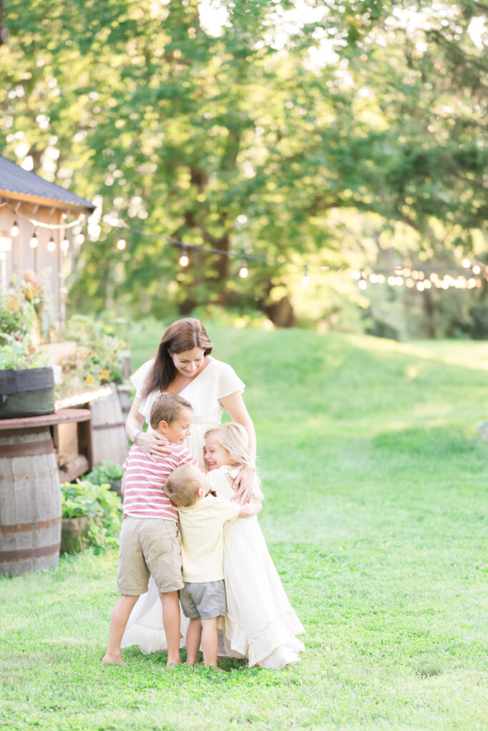 mom with toddler, daughter and son in client closet dress from Golden Heart Photography