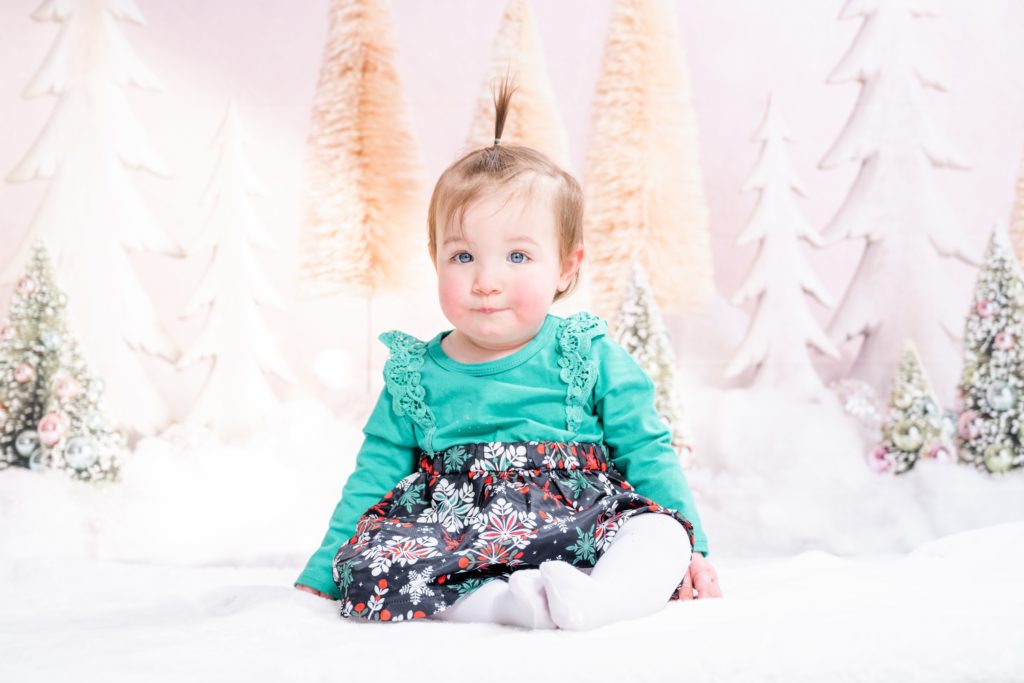 sweet girl at first birthday session with Golden Heart Photography