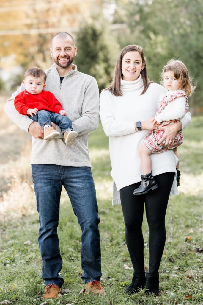 family of four poses at Golden Heart Photography session